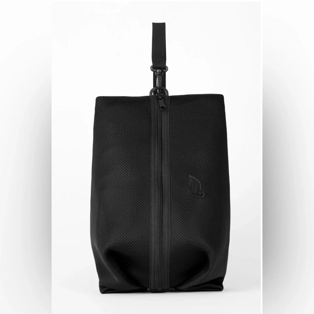 NWOT Fabletics The Functional Convertible Bag in black. New